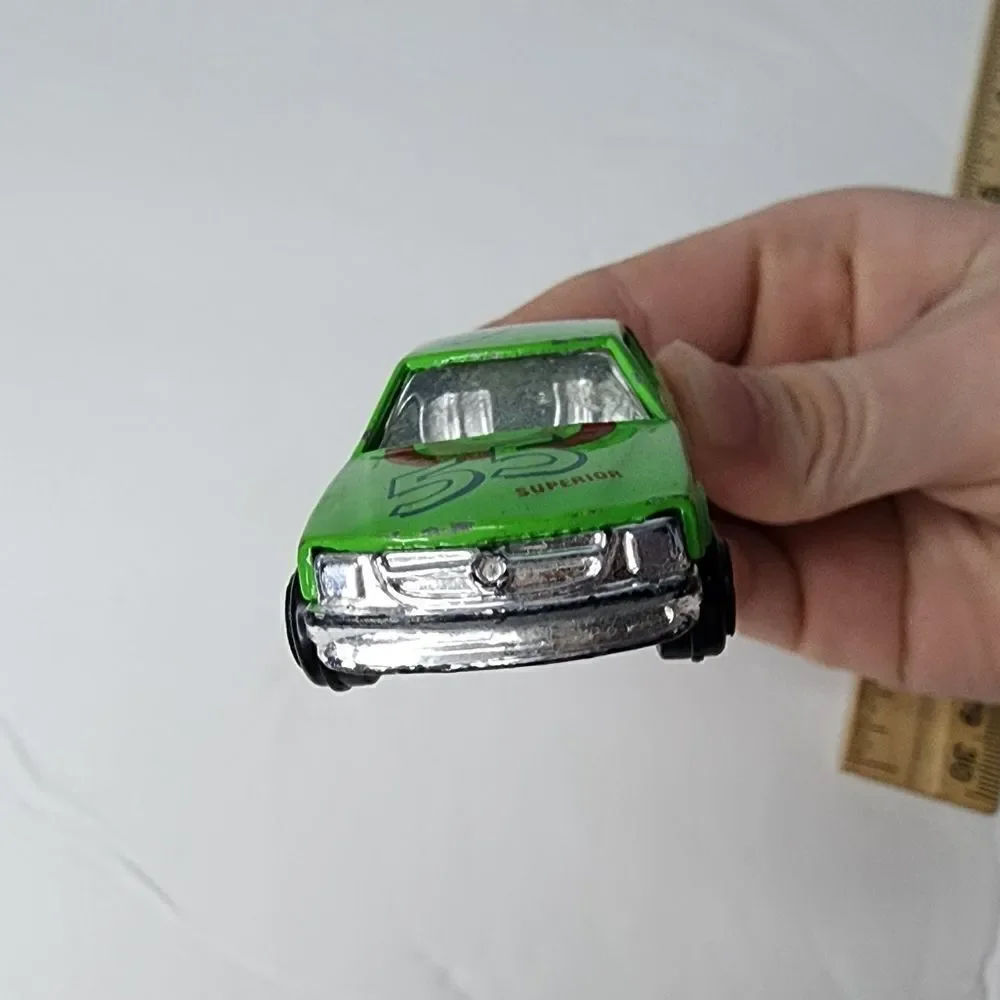 MERCEDES-BENZ 500 SEC  number 8803 can be found on inside Green Race Car #55